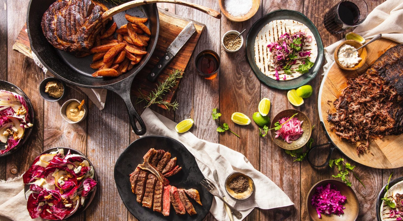 flatlay-iron-skillet-with-meat-and-other-food (1) flatlay-iron-skillet-with-meat-and-other-food (1)